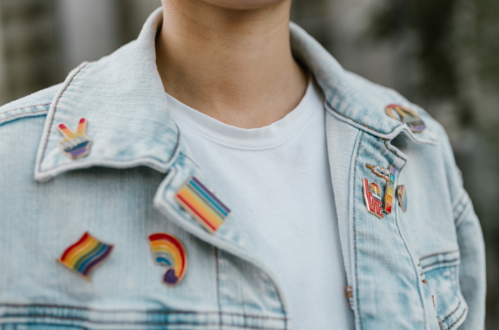 Rainbow pins on jean jacket